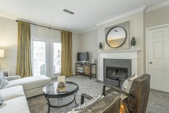 a living room with a couch and a fire place